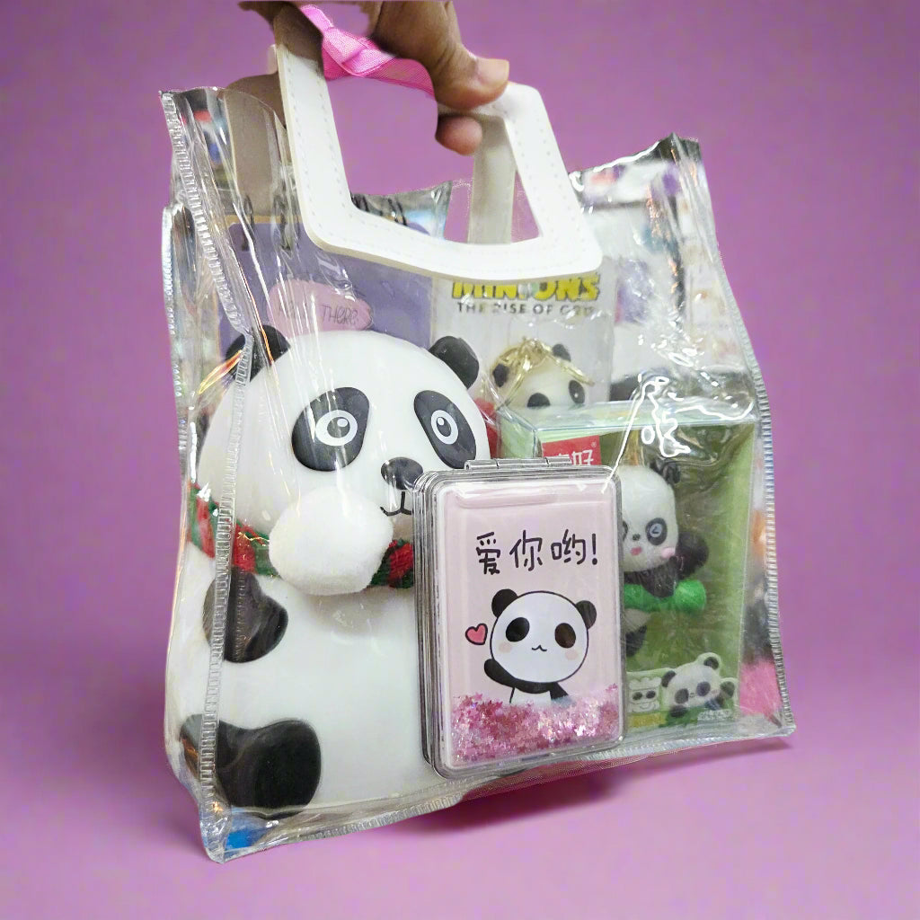 Panda-themed product set in a clear plastic bag held by a hand in a store setting.