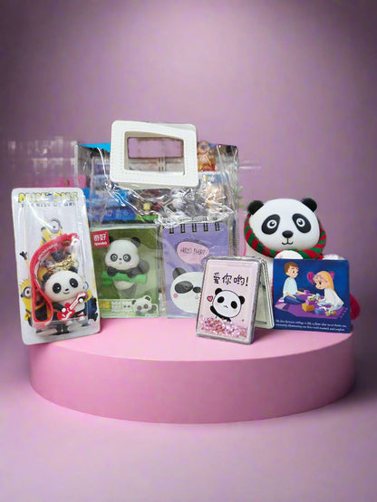 Collection of stationery items with panda designs on a shelf.