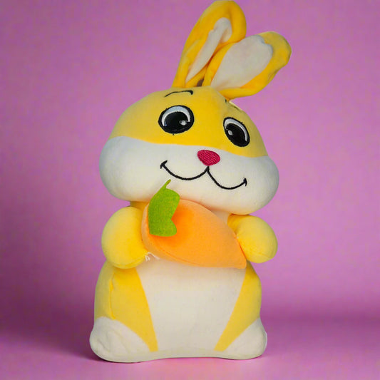 Plush toy resembling a cartoon character with a yellow body and white face on a light gray background